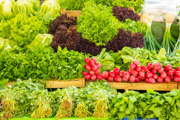 Nutrient-dense leafy greens and colourful vegetables at a market